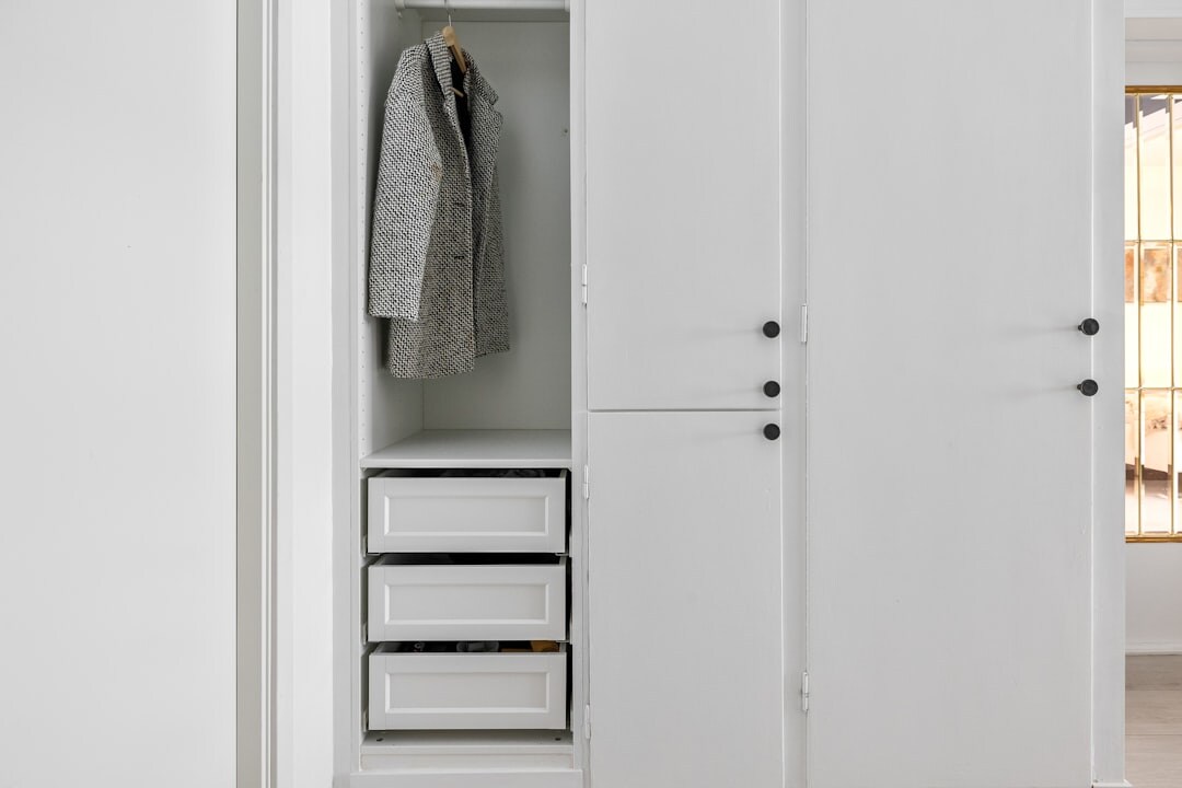 organized wardrobe with clothes
